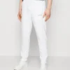 Calvin Klein Micro Logo - Tracksuit Bottoms - Bright White -Default Template 5 33a5c5369d6842b1be9d2cd4cc52d25b scaled