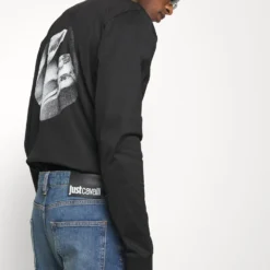 JUST CAVALLI Tasche - Slim Fit Jeans - Blue 11 JUST CAVALLI Tasche - Slim Fit Jeans - Blue -Default Template 5 68fe9b91570042299b7ced277112d858 scaled