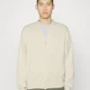 Les Deux Forrest Varsity Cardigan - Cardigan - Ivory -Default Template 5 8f8f9c72c201483bbe72f4f122ef5d19 scaled